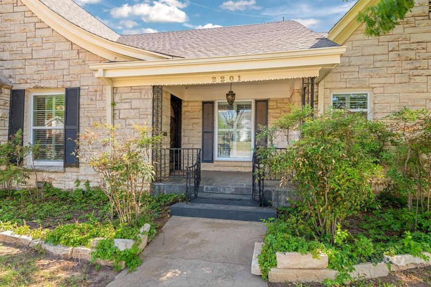 Charming stone home on a corner lot in the desirable Highland area featuring a versatile use of space.  Two bedrooms, two bathrooms, two living rooms and a large kitchen approximately 2,671 sq. ft. plus a basement with approx. 525 sq. ft. bedroom, bath, living space. This well-maintained home offers 3 fireplaces, plantation shutters on windows, refreshed interior and exterior paint, hard wood floors, and a large kitchen with stainless steel appliances. The home offers two front entrances, one side and one back for easy accessibility.  Second living could easily be used as a fourth bedroom. Enjoy a spacious corner lot with mature trees, sprinkler system, covered patio and deck—perfect for relaxing or entertaining. Convenient location near schools, shopping, and dining.