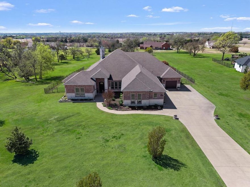 Welcome home to your little slice of Heaven!  This custom built ONE STORY tucked on a low traffic cul de sac location on nearly two spacious acres is your arrival!  This exceptionally well maintained property offers the perfect blend of space, functionality, and thoughtful design. Step inside to an open-concept design filled with natural light, enhanced by custom shutters & boast a friendly layout that offers both everyday living & entertaining. The heart of the home features a well-appointed kitchen complete with a prep kitchen and two pantry's, ideal for hosting and keeping the main space pristine. With 4 spacious BDRm's, this home truly shines in its versatility. A unique layout creates an ideal multi-generational or mother-in-law setup, featuring a garage entry leading to a private secondary primary suite, complete with space for a separate living area—offering comfort, privacy, and independence all under one roof. Outdoors, your private retreat awaits with a sparkling pool and spa, perfect for relaxing or entertaining on warm Texas days, all set against the backdrop of your spacious private homesite. ATTN: Car enthusiasts or those needing extra storage will appreciate the FOUR CAR GARAGE, while peace of mind comes with a WHOLE HOUSE GENERAC GENERATOR ensuring you’re always prepared.
This is the kind of property that checks most every box....1 Story, 4 Car Gar, Open & Bright, Multi-Generational etc etc.