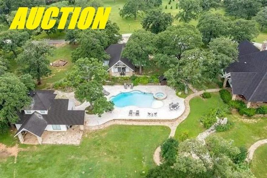 $500,000 IS THE OPENING BID FOR THIS 15 ACRE EXECUTIVE ESTATE OFFERED FOR SELL IN A LIVE AUCTION ON SATURDAY, OCTOBER 18TH AT 11:00AM. Auction Registration begins at 9am. Selling the Real Estate and Personal Property separately at Auction. The 15ac Executive Estate features a 4 Bedroom Main House, 2 Bedroom Guest House, 2 Bedroom Pool House, In-Ground Pool & Spa, 4 Car Garage-Workshop and Party Barn. 2 Gated Entrances with asphalt driveways. Perimeter fenced, landscaped with abundant mature trees. Perfect for Entertaining, Multigenerational Family Living, Corporate Outings or Wedding-Event Venue. Enjoy your privacy with shopping, dining, recreation, and entertainment nearby. Just a few miles to I-35W with easy access to Fort Worth. Sells AS IS. NO CONTINGENCIES related to Financing, Post Sale Inspections or Appraisals and NO OPTION PERIOD. 10% Buyer's Premium will be added to the High Bid to constitute the Total Contract Price. Buyer's Premium is paid the day of the Auction by Cash or a Personal or Business Check will be accepted when accompanied by a Bank Letter of Guarantee or other Proof of Funds. Remaining Balance is due on Thursday, November 20, 2025 by 5:00pm at Doster Law Group, a Fair Texas Title Company in Denton, by Cash, Financing or a combination of both.