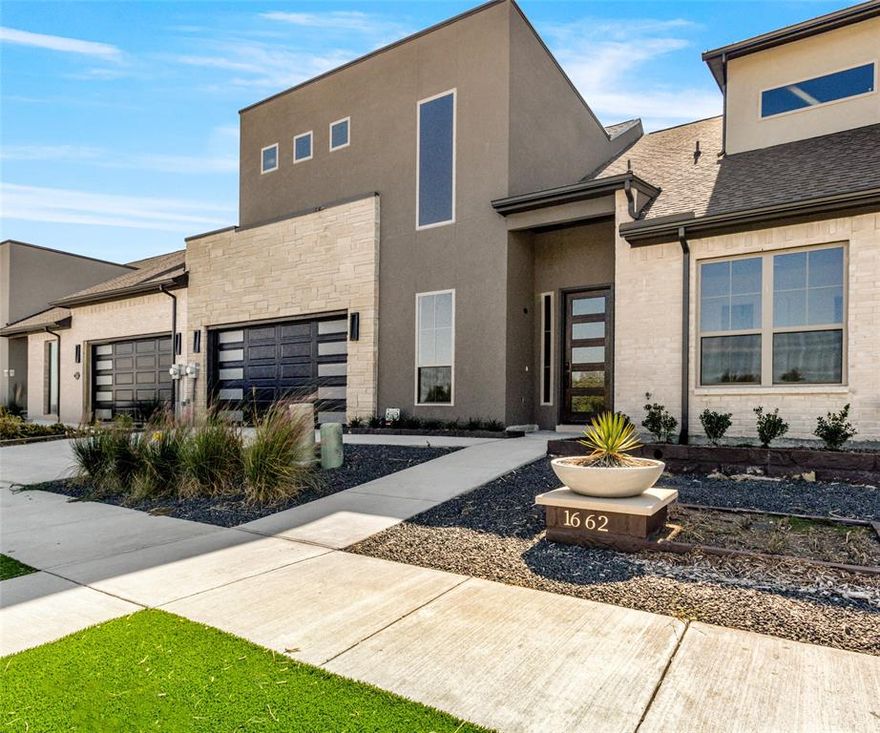 ASK ABOUT CURRENT BUILDER INCENTIVES! Exquisite Custom Townhome Overlooking Golf Course in a Premier Lakefront Community. Discover unparalleled luxury and modern living in this brand-new, custom-built townhome nestled in a prestigious lakefront community on the shores of Lake Ray Hubbard. Spanning 2,000 square feet, this meticulously crafted 2-bedroom, 2.5-bath residence offers a perfect blend of elegance, comfort, and sophistication. Step inside to soaring vaulted ceilings and an open-concept floor plan designed to maximize natural light and space. The heart of the home features a stunning cast stone fireplace that adds warmth and grandeur, perfectly complementing the custom cabinetry throughout. Designer lighting enhances the ambiance, while large picture-frame windows frame breathtaking views of a serene golf course putting green, offering a peaceful retreat right outside your door. The gourmet kitchen flows seamlessly into the living and dining areas, creating an ideal space for entertaining. With premium finishes and thoughtful design, every detail reflects luxury and comfort. The two spacious bedrooms offer privacy and relaxation, with spa-inspired bathrooms that feature high-end fixtures and materials. Beyond the home, this exclusive community provides an unmatched lifestyle. Enjoy world-class amenities, including access to golf, tennis courts, swimming, and yachting. The community clubhouse offers a restaurant, fitness center, and gathering spaces, making it easy to connect and unwind. Perfectly situated on Lake Ray Hubbard, residents have direct access to the water for boating and lakeside adventures. Whether you’re enjoying a quiet evening at home, hitting the links, or indulging in the vibrant social scene, this townhome delivers an extraordinary living experience. Don’t miss the opportunity to own this remarkable home—schedule your private tour today and start living the lifestyle you deserve!