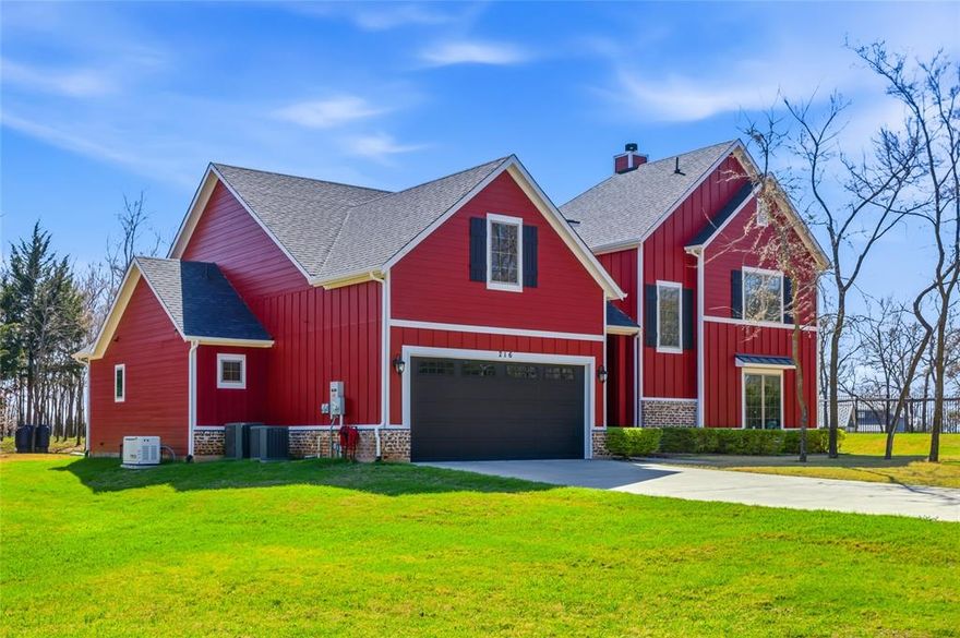 A ONE OF A KIND CUSTOM FAMILY LAKESIDE HOME ON 2 ACRES FEATURES 3 BEDROOMS, 3 BATHS, AND GAME ROOM. JUST A 8 MINUTE WALK TO LAKE TEXOMA!! Welcome your friends and family to a modern lake house feel with great architecture, 20 ft vaulted ceilings, wood like tile throughout the first floor & large windows with custom trim. Granite & quartz counter tops, white shaker cabinets and stainless steel appliances in this chefs kitchen. Covered back porch overlooking the heavily treed lot. The private master bedroom is downstairs. Master bath has double vanities and a tiled shower. Walk-in closet is 12x7. Split Second bedroom and full bath are downstairs. 3rd bed & full bath upstairs. Huge gameroom upstairs, could be media room or office.  The home has fresh well water, with a customized filtering system.  A whole home Generac Generator provides power in case of an outage.  There is a beautiful Greenhouse with irrigation and power.  A top notch security system is in place for safety.  THIS HOME HAS IT ALL!  CONTACT YOUR FAVORITE REALTOR FOR A SHOWING!  DON'T MISS OUT!