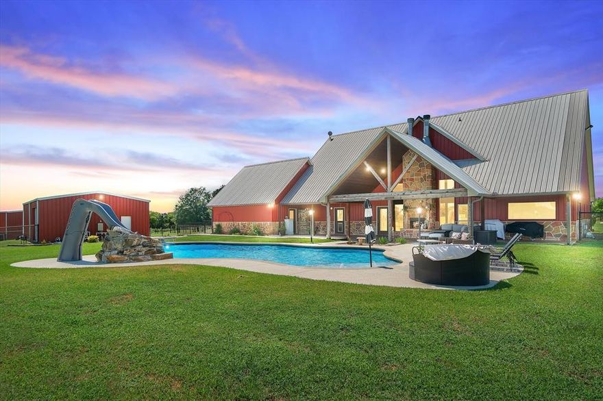Located on sprawling acreage in the highly sought-after Wills Point ISD and conveniently close to Highway 20, this custom-built 5-bedroom estate offers luxury living in a peaceful country setting. Designed with exceptional attention to detail, the home features high-end limestone countertops, custom flooring, elegant fixtures, stainless steel appliances, and charming farmhouse accents throughout. Step outside to your private backyard oasis—complete with a sparkling pool and slide, perfect for entertaining or cooling off on hot Texas days. Enjoy year-round comfort in the spacious game room equipped with both heat and AC. The home also boasts walk-in closets in every bedroom and an abundance of natural light. For equestrian lovers, the property includes a fully stocked tank and a horse barn designed with space for an indoor round pen. A perfect blend of rustic charm and modern amenities—this one-of-a-kind ranch retreat has it all!