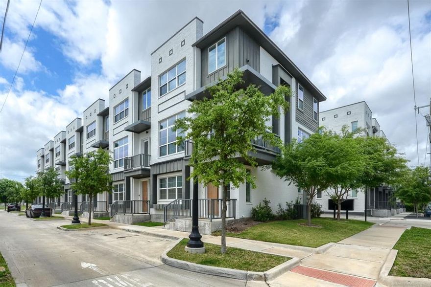 Modern luxury meets ultimate walkability in this 2022-built condo at Mustang Station. This 3-BR, 3.1-BA residence spans nearly 2,000 SF of high-end design. The chef’s kitchen impresses with a massive granite waterfall island, bold geometric backsplash, & designer lighting. Open-concept living features 11ft ceilings, wide-plank flooring, & a private balcony. Every bedroom is a private suite with its own full bath—perfect for guests or a home office. Includes an attached 2-car garage! Step outside to acclaimed dining like Roots Southern Table & Bankhead Brewery. Commuters will love the 5-min walk to the DART Green Line for easy access to Downtown Dallas. Experience the City in a Park lifestyle with low-maintenance living & unparalleled convenience.
