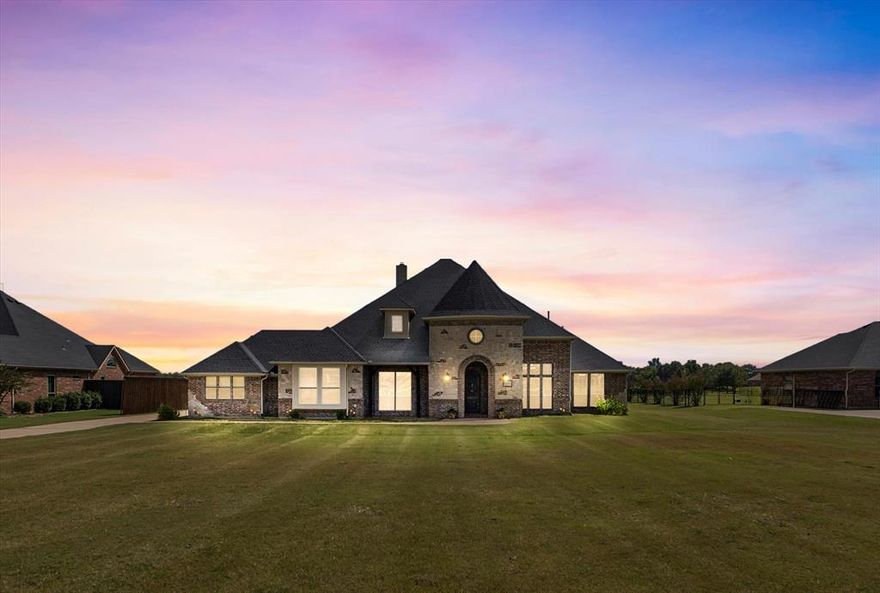 WATERFRONT Living Meets Country Charm! This spacious 3,008 sq ft single story home sits on 1.60 acres of country bliss with a PRIVATE DOCK- perfect for fishing or just relaxing while the sun sparkles on the water. Inside you will find 4 bedrooms, 3 full baths, 2 dining areas and a cozy fireplace in the living room that's just waiting for movie nights or holiday gatherings.  Bonus Room can be an office or another bedroom is desired.  The open layout makes entertaining a breeze. Don't miss the Primary Bedroom Closet, it is every woman's dream!  While enjoying all of this wide-open space, you are still close to retail shopping, dining and conveniences, easy access to Hwy 20 and 80. Come Home to a perfect blend of tranquility and convenience.  Schedule your private viewing today!