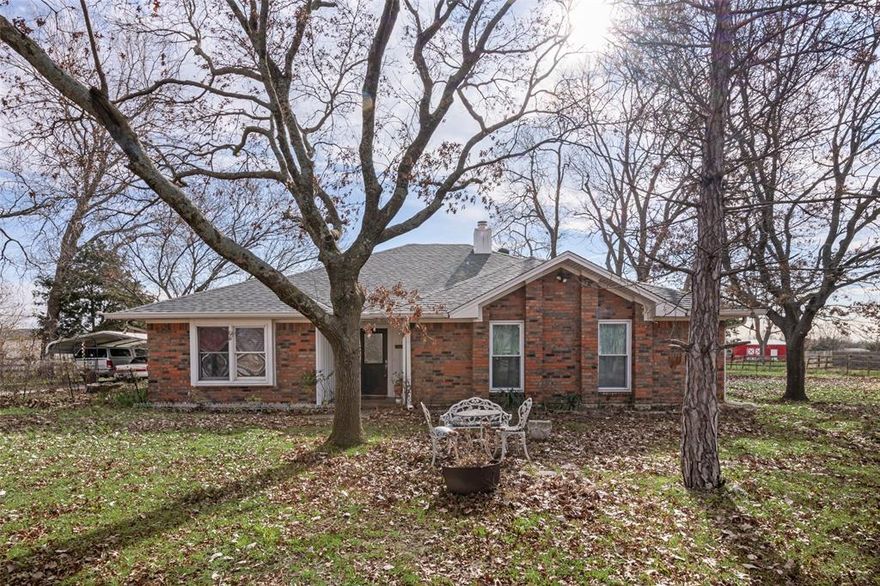 Less than a quarter mile from the Lake Lavon boat ramp, this beautifully maintained 4-bedroom, 2-bath home offers the perfect blend of privacy, space, and outdoor living. Set on 1.5 acres dotted with mature trees, the property delivers a peaceful country feel while keeping you close to the water.   It’s perfect for lake lovers and outdoor enthusiasts.  Inside, you’ll find an updated kitchen with modern finishes, ample cabinet space, and plenty of room for cooking and entertaining. The comfortable family layout offers open living areas and spacious bedrooms. Outside, there are multiple storage buildings—ideal for tools, boats, or hobbies, plus plenty of room for gardening or gatherings under the mature tree canopy.  Recently updated dishwasher and stove, adding convenience and efficiency.  The Septic system was recently replaced 5 years ago, providing peace of mind for years to come.  Updated gutters and siding, enhancing both curb appeal and long-term durability

This property combines convenience, comfort, and nature’s beauty—an ideal retreat just minutes from the lake