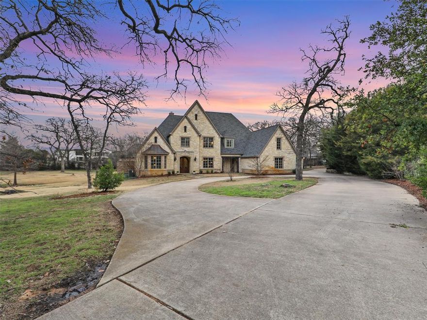 Welcome Home to this idyllic Colleyville Estate tucked away on 2.41 acres at the end of a cul-de-sac. Stately and private, you enter through the gated entrance to an impressive circle drive. Perfect for family and entertaining, you are greeted with a soaring Foyer and winding spiral staircase, Executive Study with charming fireplace + built ins and amazing views of frontscape lawn, and an inviting Dining Room. The spacious Family Room boast walls of glass overlooking the backyard oasis and rolling hills with mature trees, plus another fireplace. Chef's Kitchen boasts a commercial grade range, built-in refrigerator-freezer, dual sinks, island + a sep Wine room + lovely Breakfast area overlooking property. Large Great- Club room off the Kitchen is ready to enjoy a crowd of friends or to watch the big game with vaulted beamed ceiling + built in Wet Bar. Gracious Primary suite is a private & peaceful retreat with 2 walk-in closets, updated white Spa Bathroom and tranquil patio. Upstairs you find 4 Bedroom suites, Media Room+ an Exercise Room. Step outside to a PARK-LIKE setting complete with infinity edge pool, outdoor kitchen area with grill and fireplace, covered seating area, large grass area for play and sports, enormous 6 hole Putting Green with 3 tee boxes at various distances and floodlight for nighttime play, mature trees and even a storm shelter in the garage. A Rare Find!!!