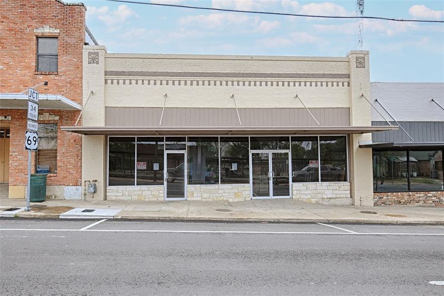 Featuring some of the original brick walls, clear-span wide-open space, and a completely refreshed storefront on Lee Street, this is your opportunity to jump on board the growth of Downtown Greenville! Just off the Square, this building features fresh exterior paint and new awning. This space is the left side of the building in the photos, with a single entrance and a small restroom. Space will include new HVAC system. This could be ideal retail or hospitality space -- a restaurant, a bakery, or a microbrewery – among its many possible use cases. The roof has been sealed and painted foam insulation added. Don’t miss this location just down the street from the Hunt County Courthouse and across from the Farmers Market, as well as proximity to all the other downtown businesses.