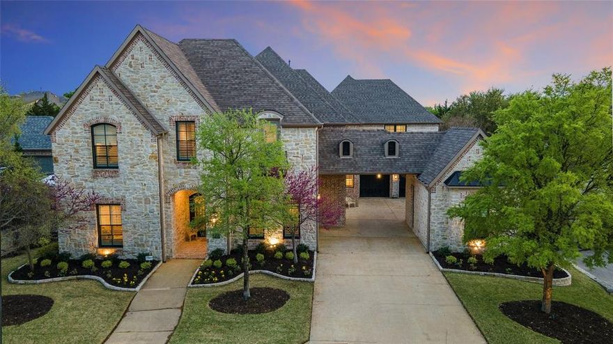 Set within the guard-gated community of Kings Lake in Stonebridge Ranch, this exceptional home boasts the look and feel of a new custom home. Originally built in 2014, it underwent a complete transformation in 2022, and a substantial 1,850sqft addition by GG Cain Custom Homes. Luxury finishes throughout, hand-scraped oak hardwood floors with seamless transitions, solid-core doors, Baldwin hardware, real wood millwork, and custom 3” wood shutters. His and Her luxury offices, each with double doors and floor-to-ceiling cabinetry with under-cabinet lighting, are just off the entry. The kitchen is outfitted with dual 36” Sub-Zero refrigerators and a Sub-Zero freezer, with wood panels, a 48” Wolf gas range, and a Scotsman nugget ice maker. The wine room has brick walls, a handcrafted iron door, Sub-Zero dual-zone wine fridge, and a ceiling made from reclaimed wine barrels and crates. The living room features an 11ft sliding glass door, creating a seamless indoor-outdoor connection. The laundry room is nearly 160sqft and boasts 3 walls of cabinets, built-in folding table, utility sink, and commercial-grade ELEVATOR. Entertainment spaces includes a media room wired for 7.1 surround sound with a wet bar and Sub-Zero under-counter fridge, a pool room, and a game room. A secondary primary suite offers dual sinks, while additional BRs each include ensuite baths. Outdoor living features a fireplace, infrared heaters, tongue-and-groove stained ceiling, and a retractable screen. Pool has a tanning ledge, 9ft deep end, and a Pentair IntelliChem self-cleaning and chemical management. A smart-enabled system to control HVAC, pool, garage doors, security, and all major appliances can be controlled from your mobile device. New high-efficiency Carrier HVAC systems (2022) with 6 controllable zones, whole-home foam insulation, 2 Rinnai tankless recirculating water heaters (2023), New roof (2022), and hard-wired security system with door, window, and glass sensors. CAR LIFT in Garage.