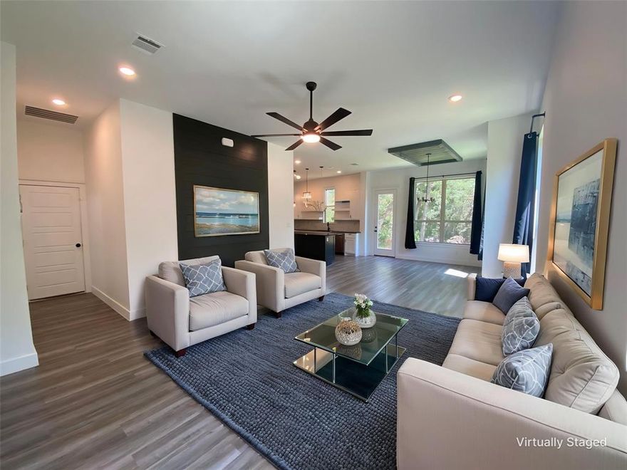 Welcome to this impeccably maintained 2023 modern farmhouse, blending the warmth of classic design with refined contemporary touches. Nestled on a spacious quarter-acre lot at the end of a quiet cul-de-sac, this lightly lived-in home offers a rare combination of comfort, privacy, and style—ideal for today’s lifestyle.

The thoughtfully designed open-concept layout features 4 bedrooms and 2.5 baths, with soaring ceilings and abundant natural light throughout. The spacious primary suite boasts a spa-inspired ensuite bath with dual vanities, a large walk-in shower, and an expansive walk-in closet. A versatile fourth bedroom on the main floor makes an ideal home office or flex space.

The gourmet kitchen is a showstopper, featuring bright quartz countertops, ample cabinetry, and a large eat-in island perfect for gatherings. High-end fixtures and finishes lend a sleek, modern feel, while rustic cedar exterior accents nod to timeless farmhouse appeal.

Upstairs, two additional bedrooms and a full bath provide privacy and comfort for family or guests. Outside, enjoy serene wooded views, greenbelt borders on both sides, and a fully fenced backyard with endless possibilities—whether you envision a garden retreat, play area, or outdoor entertainment space.

Additional highlights include a generous two-car garage, mature landscaping, and convenient access to major highways for an easy commute to Fort Worth, Decatur, or Weatherford. Located in the highly sought-after Azle ISD, this home delivers both location and luxury.

Don’t miss your chance to own this exceptional property that offers modern elegance, thoughtful design, and move-in-ready ease—all just over a year old and showing like new.