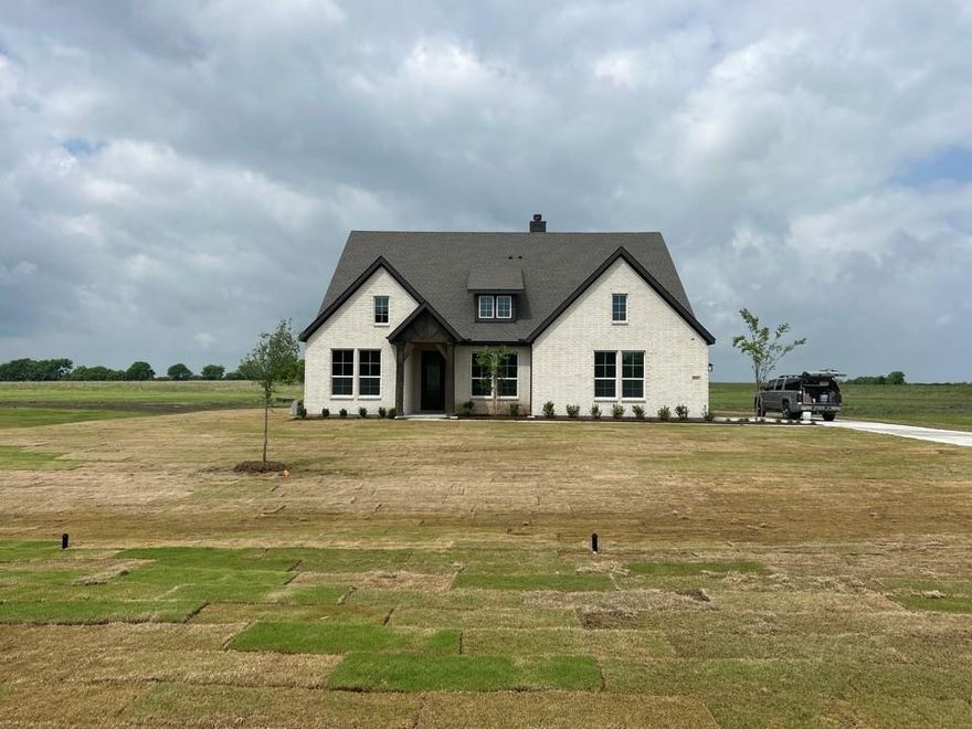 Estimaated May2026 completion! Ask us about our Trade In Trade Up program, we can buy your home! Upon entering the home off the front porch, you’re welcomed by an inviting foyer. Immediately to the left is a hallway with a bedroom, walk-in closet and full bathroom, as well as a linen closet. Past the foyer is the family entry, with storage space and mud bench, which leads to the laundry room and two or three car attached garage. Through the entrance, the home opens up to a large family room with a stately fireplace. Adjacent to the family room is a gourmet kitchen, equipped with a walk-in pantry, ample counter space and an oversized island. Finishing off this open-concept living area is a dining space which overlooks the covered back patio. A hall leads to two bedrooms with walk-in closets, another linen closet and a shared full bathroom. The back corner of the home offers privacy for the owner’s suite, featuring a massive walk-in closet and bathroom with a dual-sink vanity, standalone soaking tub and glass-enclosed shower.