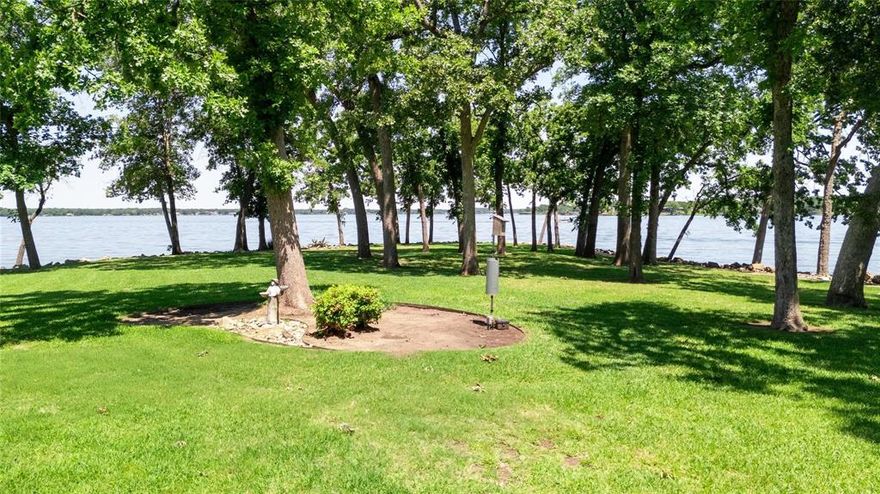 This iconic Star Harbor home sits on one of the largest and most desirable lots on Cedar Creek Lake. Timeless architecture offers 4600 square feet of sprawling single story design with high ceilings, walls of windows, ensuite baths off of every guest bedroom, master suite complete with sitting area, office, fitness room and an indoor heated pool. This stunning retreat begs of mid century modern vibes with a subtle sunken living room and round speak easy style recessed bar space perfect for gathering and telling stories! This massive 1.4 acre peninsula point has over 675 ft of wide open water shoreline exploding with water views every direction. This park like parcel offers so much room to entertain; host corporate retreat events with ample parking along the rambling circular drive or just enjoy hours of watching little bare feet making memories of their own. The dock was added in 2020 with 2 boat slips , aluminum cradles and lifts, double jet ski lift, spacious covered shady patio area on main level along with bunkhouse storage up top on the party deck! Do not forget the trapeze where you can swing out and plunge into 12 and 14' deep water! The epitomy of lake lifestyle awaits you. Star Harbor golf course community is one of the most sought after established communities on Cedar Creek Lake and surrounded by our deepest waters.