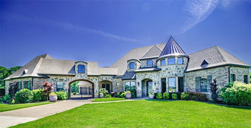 Welcome to this magnificent 5 BR, 6 BTH custom home with guest house nestled on a lush 1.76-acre lot that backs up to a serene greenbelt.  In this sprawling 5,205 SF main house each bedroom has an ensuite bathroom. The chef's dream kitchen is equipped with dual islands, built-in refrigerator, double ovens, gas cooktop, and Sonic ice machine.  Bathed in natural light, the living spaces are accentuated by massive windows that offer stunning views of the private backyard oasis which boasts an oversized patio, pool, spa, gas firepit, outdoor kitchen, dining area, cozy living space, fireplace, solar screens, and TV that are perfect for year-round enjoyment. There’s garage space for 6 cars with additional parking. Entertainment options abound with a media-game room and an office featuring built-ins.  A separate 896 SF guest house with a bespoke kitchen and appliances offers comfort and style for guests or family.  This home is a private retreat that you must see!