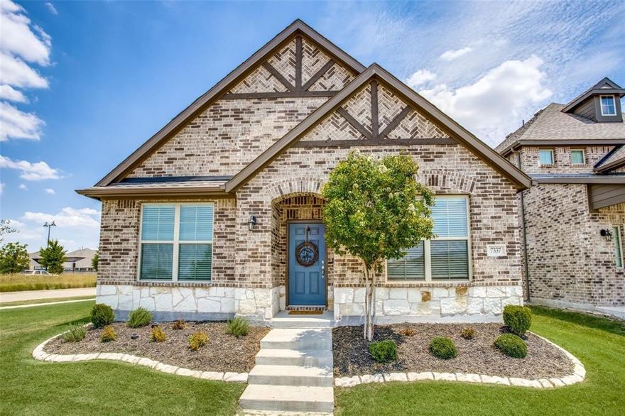 This home features 3 bedrooms with a private office or flex space. Charming elevation and curb appeal! Wood-look tile throughout the main living area, kitchen, and master bedroom. Neutral color palette throughout makes this home so light and bright! Living room features a brick fireplace with gas logs. Kitchen with gas cooktop, stainless steel appliances, large island, and granite countertops. Upgraded light fixtures throughout. Shiplap wall accents in master bedroom, master bathroom, and kitchen island. Union Park has amazing amenities for all ages. This home is low maintenance - with full backyard turf and the HOA maintains landscaping in front! Home is located in a prime location across from Union Park Elementary, and just down the street from the workout center, and splash pad. Community pool, park, and so many other amenities this lifestyle community has to offer!