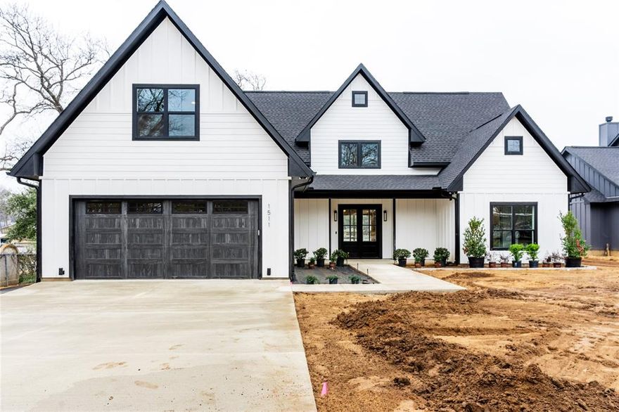 Stunning new home by Wink Construction!  Modern Farmhouse vibe on an oversized lot.  Amazing design elements throughout : engineered wood flooring, large picture windows, quartz and quartzite counters.  Amazing Kitchen, island, 2 dishwashers, 2 farmhouse sinks, wine-beverage center, beautiful butlers pantry.  2 living areas, huge bunk room.  Enjoy the outdoors on the 20 x 20 covered porch with composite decking. Fire pit and landscape complete soon.  Boathouse with party deck - composite decking with approximately 12 ft of water depth.  VRBO friendly neighborhood.