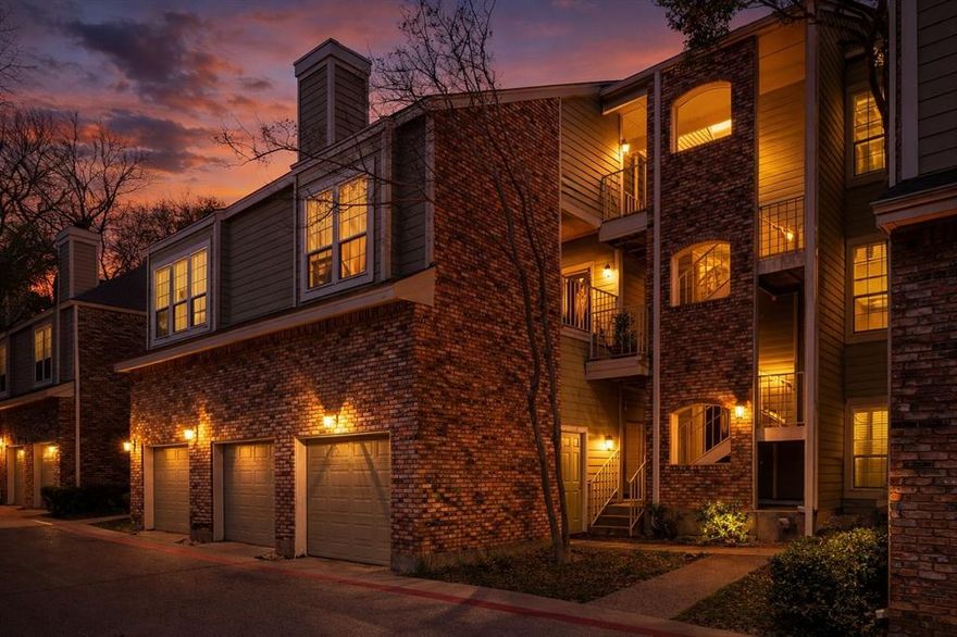 Moments from the scenic beauty of White Rock Lake, this thoughtfully updated condo offers a seamless blend of modern design and everyday comfort.

Inside, natural light pours through expansive windows, illuminating warm bamboo hardwood floors and enhancing the airy feel created by vaulted ceilings. The living room is both stylish and inviting, centered around a charming fireplace, perfect for relaxing evenings or casual gatherings.

The kitchen stands out as a true focal point, with floor-to-ceiling cabinetry providing ample storage, complemented by sleek countertops, stainless steel appliances, and a generous island with seating. Designed for both functionality and connection, it effortlessly supports everything from quiet mornings to lively entertaining.

Step onto the private balcony and take in peaceful views of mature trees, a rare sense of calm just minutes from the energy of downtown Dallas. This outdoor space extends your living area and offers a perfect setting to unwind.

The primary suite is designed with comfort and organization in mind, featuring a custom closet system and a clean, modern aesthetic. A well-appointed secondary bedroom and additional full bath provide flexibility for guests, work-from-home needs, or additional living space.

With access to a community pool and close proximity to White Rock Lake, trails, dining, and entertainment, this home offers a lifestyle that balances nature, convenience, and contemporary living.