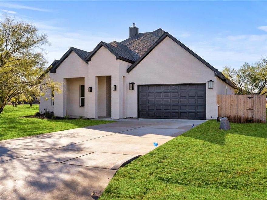 RECENTLY APPRAISED TO 560K Giving your buyer instant 25K equity! Beautifull NEW CONSTRUCTION nestled in the neighborhood of Pyramid Acres and zoned for highly sought-after Aledo ISD! NO HOA, 4 bedrooms, 2.5 bathroom home sitting on a spacious 0.32-acre fenced lot. Step inside to an inviting open layout that blends style and comfort, featuring wood-beamed ceilings and towering heights that create an inviting atmosphere. The expansive living room features a cozy fireplace, accent wall and lots of natural light. The gourmet kitchen impresses with elegant black backsplash, custom cabinets, decorative lighting and stunning quartz countertops including an eye-catching waterfall island. The kitchen is equipped with all your stainless steel appliances, microwave, range, oven and dishwasher! The master bath serves a personal retreat, complete with double sinks, a relaxing garden tub and a walk-in-shower. The spacious walk-in closet provides ample storage for all your wardrobe needs. The laundry room includes a mud station and sink for added ease. Outdoor enthusiasts will appreciate the sprinkler system, covered patio and oversized lot! Builder providing 1-2-10 warranty!