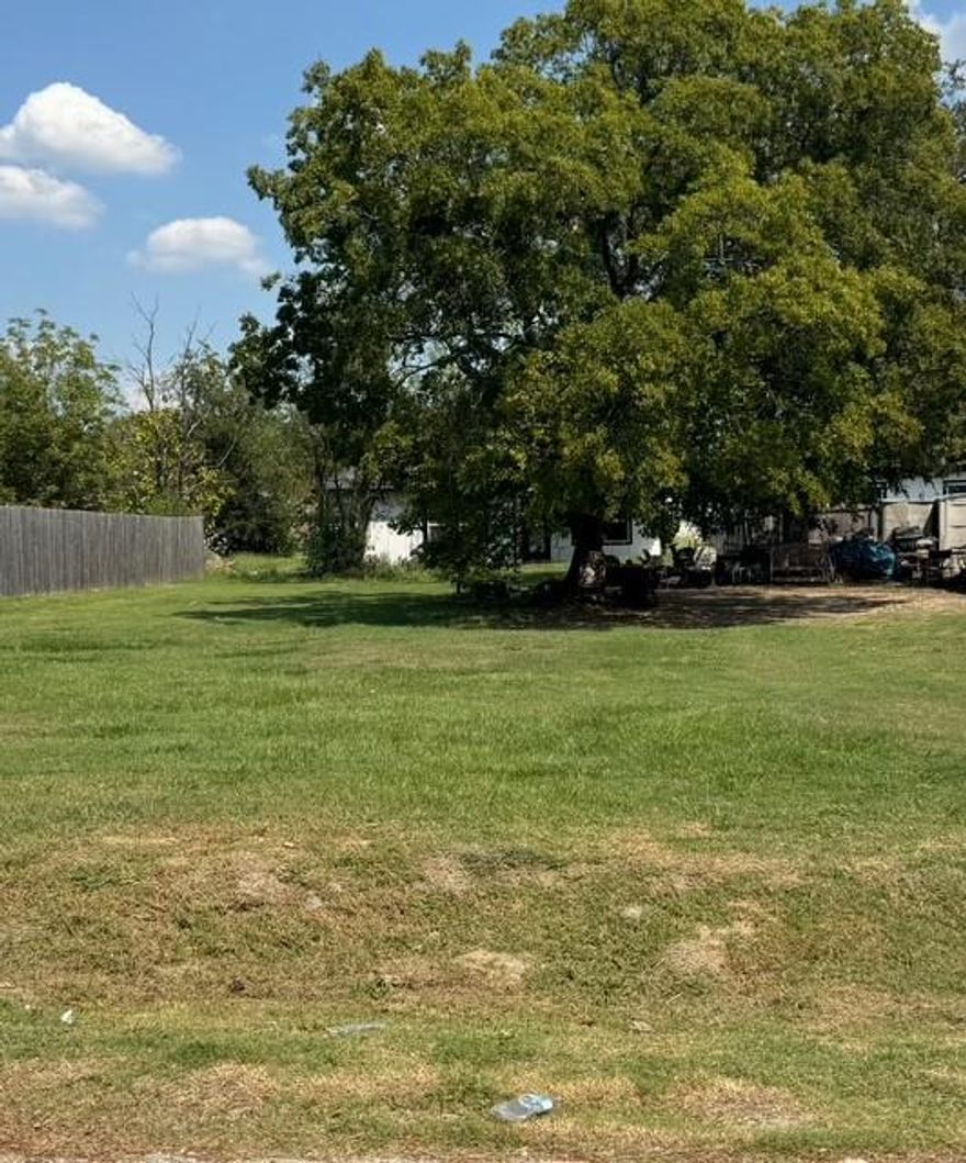 Great opportunity to own a oversized lot in established area within Terrell city limit.  No HOA restriction! Easy access to highway and down town area. Ready to build on. This interior interior lot has been cleared yet still has a large established tree, water, sewer and electricity available.  No HOA Restrictions!