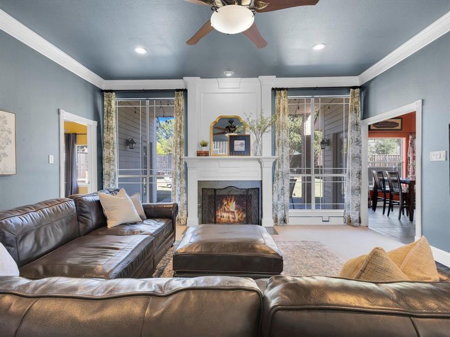 Nestled on a serene third-acre lot in the heart of Ovilla, this elegant residence perfectly blends timeless design with modern comfort — just minutes from Dallas. Step inside to discover soaring ceilings, walls of natural light, and a dramatic curved staircase that instantly sets the tone for refined living. The thoughtfully designed layout offers multiple living and flex spaces, ideal for family game nights, a home gym, or a quiet reading retreat. The open-concept kitchen and living area flow effortlessly to the outdoor entertaining space — the perfect backdrop for evenings by the fire pit, weekend BBQs, and starlit gatherings. The luxurious primary suite is a true escape — featuring dual oversized walk-in closets and a spa-inspired ensuite bath designed for relaxation. Thoughtful upgrades, including a whole-house instant hot-water system, bringing everyday convenience to a new level. Out front, a stately magnolia tree and classic pillars create an unforgettable first impression, while the oversized rear-entry garage provides plenty of room for vehicles, storage, and a workbench for your favorite DIY projects. From the striking architecture to the versatile living spaces, this home captures the best of comfort, functionality, and Texas charm — all in a peaceful neighborhood setting. Schedule your showing today!