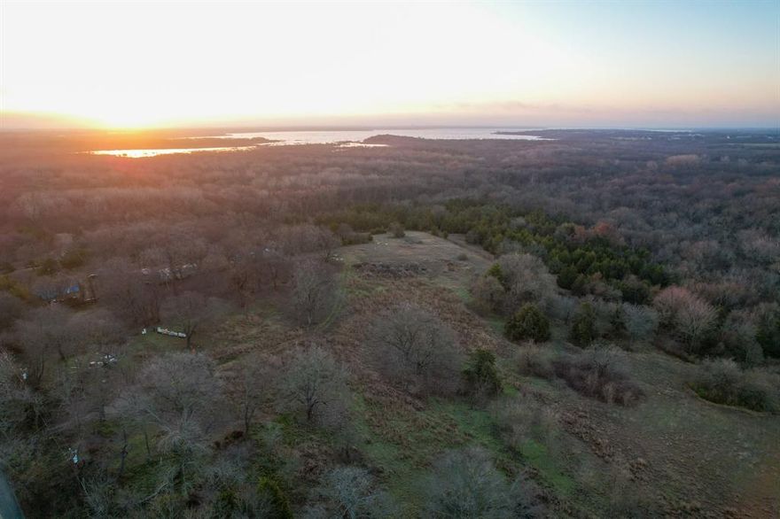 This Collin County 15.04 acre property in McKinney, Texas, isn’t just a prime development opportunity, it’s an outdoorsman’s dream sitting in the heart of one of North Texas’ fastest-growing markets. Backing onto 1,000 acres of Lake Lavon Recreational Area Corps Land, this tract is surrounded by habitat known for producing big, mature Collin County bucks and heavy wildlife activity. The combination of open meadows, mature timber, natural cover, and minimal hunting pressure creates the perfect environment for consistently large deer, making this a rare chance to own land where trophy-class whitetails roam your back fence line.

The property features over ¼ mile of asphalt road frontage, mostly level terrain, and a mix of fields and trees ideal for hunting setups, blinds, and feeders. It already includes electricity, a water meter, and a water spigot, with county water running along the road — giving you development-ready utilities whether you’re building a private hunting retreat, a family estate, or a future residential project.

Beyond hunting, outdoor enthusiasts will appreciate being just 400 yards from Trinity Trail, offering 25 miles of hiking and horseback riding. And despite the secluded feel, you're only 8.6 miles from Downtown McKinney and 37 miles from Downtown Dallas, offering the perfect blend of country living and city access.

With Collin County’s rapid population growth, top-rated schools, and strong local economy, demand for quality land continues to climb — giving this property both strong recreational and investment appeal. Whether you're after a private hunting getaway, a place to build your dream home, or a strategic long-term hold, this acreage checks all the boxes.

All showings are by appointment only.