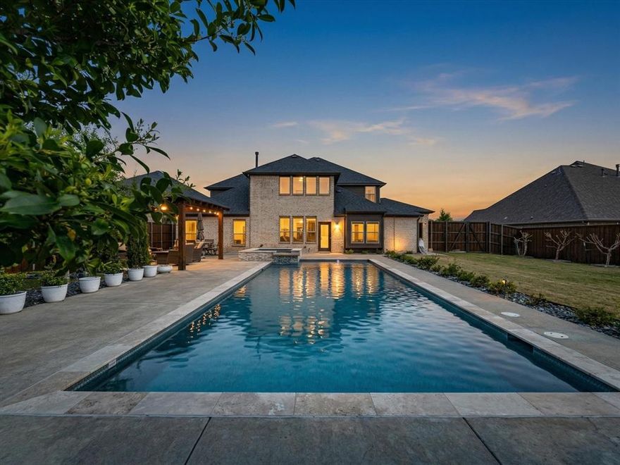 Welcome to your private retreat in the prestigious The Estates of Garden Valley, where space, beauty, and thoughtful design come together on over half an acre. This meticulously maintained 4 bedroom, 3 bath home with a 3 car garage offers more than 3,500 square feet of bright, open living, perfectly suited for both everyday comfort and effortless entertaining. From the moment you arrive, the mature landscaping creates a sense of warmth and established elegance. Inside, natural light pours through the open floor plan, highlighting vaulted ceilings, quartz countertops, and generous living spaces. With two living areas and two dining areas, there is room for everyone to gather or spread out with ease. A designated home office with French doors provides the ideal work from home setup, while the mud room adds practical function to everyday living. Step outside and experience a backyard designed to impress. The sparkling pool and hot tub invite relaxation, while the gazebo covered seating area, complete with electricity, sets the stage for outdoor entertaining year round. The pergola & gazebo both have electrical, while the covered gazebo is also wired for cable as well. The outdoor amenities are the perfect setting for evenings under the stars, and the thriving vegetable garden offers both beauty and bounty. Along the side, a low maintenance orchard produces fresh, delicious fruit, while the back fence is lined with rose bushes ready to bloom into a stunning display of color and life. This is more than a home, it is a lifestyle of comfort, space, and natural beauty. The seller warmly welcomes your visit.