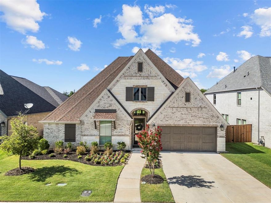 Welcome to the prestigious gated community of The Lakes of Somercrest in Midlothian, where luxury and comfort meet in this stunning 4-bedroom, 3-bath Perry Home. Thoughtfully designed with high-end custom features throughout, this home offers elegance from the moment you walk through the door. The grand entry greets you with soaring 12-foot ceilings, eye-catching custom wallpaper, and elegant sconce lighting, setting the tone for what’s to come. The open-concept living area features a cozy gas fireplace and flows seamlessly into the oversized chef’s kitchen—perfect for entertaining—complete with stainless steel appliances, a gas cooktop, and generous counter space. Custom drapes and shutters provide a polished, move-in-ready finish. The inviting den is a true showstopper, boasting beautiful built-ins and a modern electric fireplace. The spacious primary suite is a peaceful retreat with 13-foot ceilings, abundant natural light, and a striking custom feature wall. The luxurious en-suite bath includes a garden tub, double vanities, his-and-her closets, and upgraded hardware and cabinetry. Secondary bedrooms are generously sized and include a convenient Jack-and-Jill bath setup. Even the laundry room shines with custom backsplash and built-in cabinetry. This exquisite home leaves no detail untouched—don’t miss your chance to live in one of Midlothian’s most desirable neighborhoods.