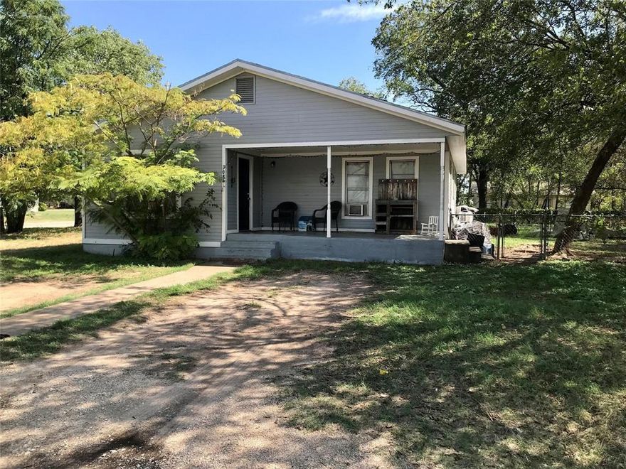 Excellent investment opportunity!  Three separate income streams on this property in the city limits.  The main house is a two bedroom one bath home.  It has an open floor plan with a large kitchen.  The other two rentals are both one bedrooms.  All are occupied with long term tenants.  This property could continue as a great income property, or would make an exceptional home with extra room for extended family!