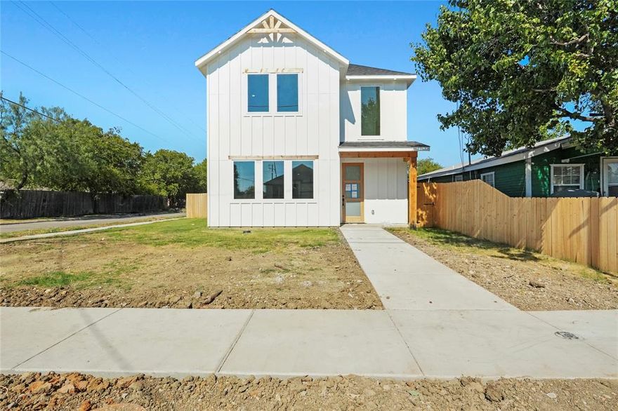 Builder is offering $9,000 that can be applied toward closing costs or an interest rate buy down! Step into this modern 2025 new build that perfectly combines style, functionality, and comfort. As you enter, you’re welcomed by an open floor plan with high ceilings and an inviting electric fireplace that sets the tone for the living area. The kitchen is a true centerpiece, featuring a large quartz island, electric stove, built-in microwave, and pot filler, perfect for cooking and entertaining alike. Off the kitchen sits a cozy dining space, ideal for family meals and gatherings. The first floor also offers a convenient built-in desk area, great for working from home or keeping the household organized. Outside, you’ll find a spacious backyard with an electric gate that provides secure access to the 2-car garage. Upstairs, you’ll discover all three bedrooms, including a serene primary suite filled with natural light from two large windows. The luxurious primary bathroom features a double vanity, walk-in shower with a rainfall showerhead, and a soaking tub to unwind after a long day. The laundry room is also located on the second floor for added convenience. Located just minutes from Trinity Groves, Downtown Dallas, and some of the city’s best restaurants and entertainment, this home offers the perfect balance of urban living and modern comfort.