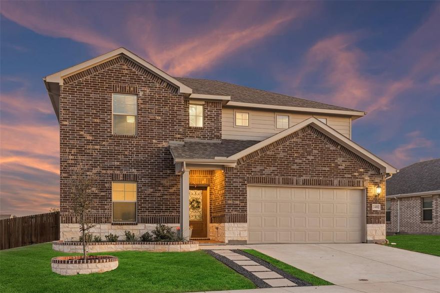 Five bedrooms, 3 bathrooms and approximately 3,050 square feet in Fort Worth Texas define this 2 story home in the Cibolo Hills community of Tarrant County zoned to Eagle Mountain Saginaw ISD. Positioned near Interstate 35W and Loop 820 with access to US 287, Cibolo Hills in Fort Worth offers commuter connectivity toward the Alliance Corridor and Downtown Fort Worth while remaining minutes from Alliance Town Center, Tanger Outlets and Presidio Towne Crossing. Designed for open concept efficiency, the floor plan includes a primary suite on the main level with dual vanities, walk in shower and generous closet space. Secondary bedrooms and an upstairs living area create separation between private retreats and shared gathering areas. If you are searching for 5 bedroom homes in Fort Worth Texas within Eagle Mountain Saginaw ISD near Eagle Mountain Lake, this layout supports functionality and long term value. The main living area provides natural light and flows into a kitchen with granite countertops, oversized island, Whirlpool appliances including electric cooktop and oven, microwave and pantry storage. Buyers comparing newer construction homes in north Fort Worth may appreciate the 2023 build, high efficiency HVAC system, energy efficient water heater, double pane windows and added insulation. Outdoor living extends to a covered patio overlooking a fenced backyard on a corner lot with paver walkways and landscaped beds. Community amenities in Cibolo Hills include a clubhouse, pool, lake, trails and playground areas. Nearby conveniences include Kroger and Sprouts along Bonds Ranch Road, medical services at Texas Health Harris Methodist Hospital Alliance and recreation at Marine Creek Lake and Eagle Mountain Lake. This property presents a balanced combination of layout versatility, Eagle Mountain Saginaw ISD zoning and strategic positioning within the Fort Worth Texas market.