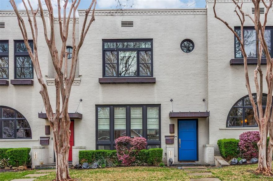 This beautifully designed townhome blends urban exterior charm with a refined traditional interior, ideally situated between Monticello and the Cultural District. These townhomes are rarely available.  Bathed in natural light, the open-concept layout showcases rich hardwood floors that seamlessly connect the dining area, living room, and kitchen—all leading to a striking wall of windows overlooking a private courtyard. The wall from entry to living room would make an impressive gallery area for art display. The dining room greets you at the front of the home and flows into a well-appointed butler's pantry featuring built-in cabinetry and a convenient coat closet. The kitchen is both stylish and functional, offering granite countertops, stainless steel appliances, a breakfast bar, and a pantry for additional storage. Upstairs, a graceful staircase leads to the primary suite with a private en-suite bath, along with a second bedroom that also features its own en-suite. A full-size laundry closet is thoughtfully located in a skylit hallway, adding both convenience and natural brightness. The outdoor courtyard is designed for low-maintenance enjoyment as an entertainment and gardening space with a drip irrigation system, and a covered walkway connects to the detached garage. A second staircase leads to a private guest suite above the garage, offering a loft-style layout with its own en-suite bath—perfect for visitors, a home office or studio space. Additional highlights include a spacious two-car garage with extra storage and an alley entrance with additional guest parking available directly in front completing this exceptional property. Located just moments from West 7th Street, area museums and UNT Health Science Center, this home offers easy walkable access to restaurants, parks, shopping and grocery stores.