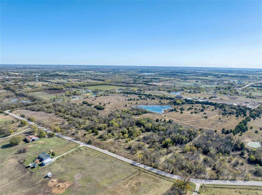 52.779 Acres – Could be a Corporate Campus with a great view or a beautiful subdivision or keep it in Ag. This property has half a mile of road frontage and is 12 miles from the new McKinney National Airport. Commercial flights begin in 2026. CR470 which is on two sides of the property turns into 1827 in Altoga which takes you to 380 in McKinney and across from the new airport. There are two ponds and a wet weather creek on the property. The survey shows that only the creek bed is in a flood zone. There is a new 8 inch water line with fire hydrants around the property to accommodate new subdivisions going in down the street. Electric, water and 1 septic tank are on site. The Collin County Planning Office records show a proposed 4 lane road on the east side of the property that would run into 545 just outside of Blue Ridge. Currently leased in Ag. So many possibilities or great investment with Collin County being among the top counties in the US for growth, prices will only increase. Asking $3.1M or best offer.