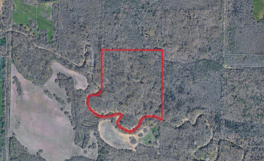 Want you own piece of Hunt County? If you are looking for a seller-financed remote getaway or if you're an avid outdoorsman or just looking for the ultimate private retreat, this secluded property might be calling your name! Nestled in the winding curves of the South Sulphur River, this land boasts a variety of wildlife, including deer and hogs, making it perfect for hunters or observers alike. This property offers the utmost in privacy as it is accessible only via a legal easement. The nearby road is not a throughway, ensuring you won’t have unwanted traffic disturbing your peaceful retreat. The entire property lies within the 100-year floodplain and a distance from utilities, meaning that you won’t be able to build a dream home, but it would be perfect for camping or building an off-grid structure raised above the ground. A rare find, this property is only about 10 minutes from the towns of Wolfe City and Commerce, and only about an hour from the Dallas-Fort Worth metroplex, making it easy to get away from it all while still being close to modern amenities. Seller has a survey of the property and of the recently recorded access easement.