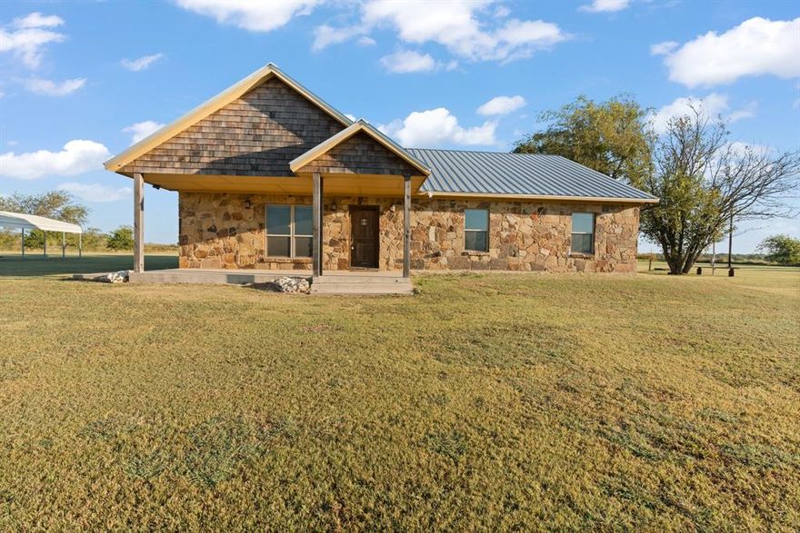 Welcome to your private country retreat on 54 acres in Godley, Texas!
This beautiful 1,932 sq ft home perfectly combines rustic charm with modern comfort. Step inside to an inviting open-concept layout featuring rich wood look tile flooring, a cozy stone fireplace with a wood-burning stove, and a warm, welcoming kitchen complete with granite countertops, custom knotty pine cabinets, and a spacious breakfast bar. The living area offers plenty of natural light and a relaxed atmosphere—perfect for family gatherings or entertaining guests.
The primary suite features a spa-inspired bathroom with a double vanity, granite counters, and a stunning tiled walk-in shower. Additional bedrooms are spacious and versatile, ideal for guests, home office, or hobbies.
Outside, enjoy peaceful country living surrounded by wide-open spaces—perfect for cattle, horses, or recreational use. With 54 acres of gently rolling land, there’s plenty of room for expansion, barns, or building your dream shop.
Located just minutes from Godley and within easy access to major highways including the chisholm trail parkway , this property offers the perfect blend of tranquility and convenience.
Come experience the beauty of Texas country living at 3800 County Road 1011. Where privacy, space, and charm meet.
