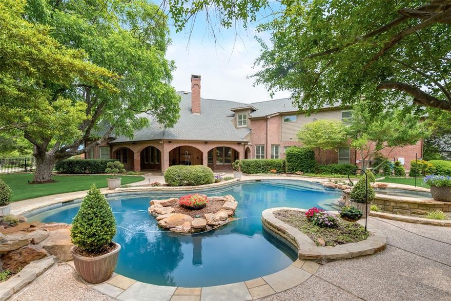 EXQUISITE CUSTOM-BUILT ESTATE NESTLED ON A PRIVATE CORNER LOT IN GATED PROVINE FARMS, A HAVEN OF LUXURY! Surrounded by mature trees, the meticulously maintained residence boasts a pool & spa, complemented by a spacious wooded yard, ready for relaxation or fun. High-quality finish out & attention to detail are evident with high-tech features thru out. Indulge in the property's opulence where the interior is adorned with beautiful wood molding features, arches, & three indoor fireplaces that add a touch of warmth & sophistication. The travertine flooring throughout enhances the timeless elegance, while cathedral ceilings elevate the sense of grandeur, creating a truly luxurious living space. Ideal for entertaining, the gourmet kitchen features top-of-the-line appliances, while lush landscaping enhances the property’s allure. 3-car garage with epoxy floors & equipped with custom storage features complete this sophisticated & inviting home. 25kw home generator & all furnishings included.