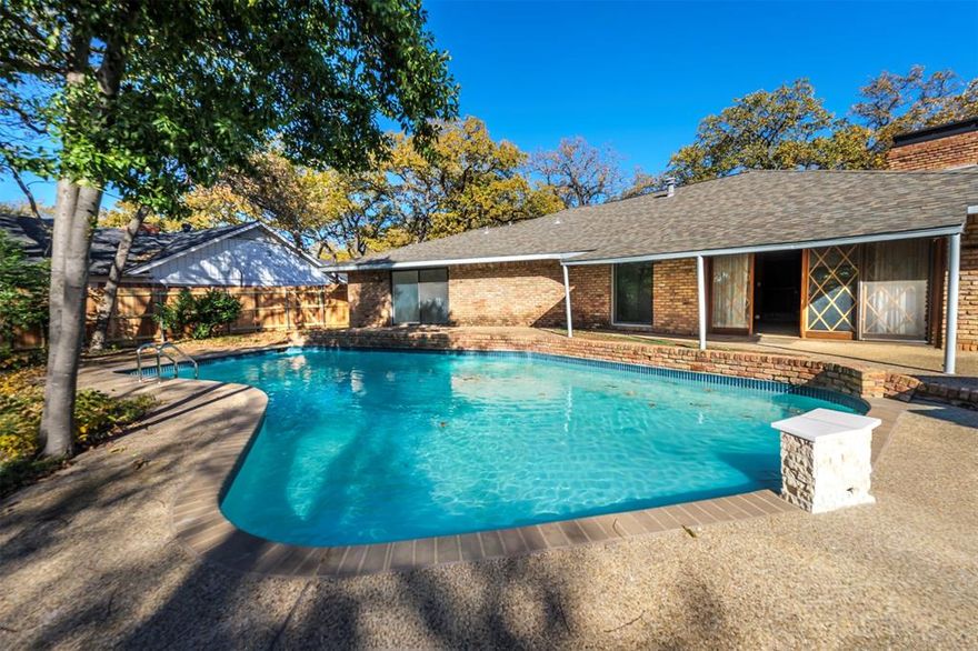 Welcome to your serene oasis! Set on a spacious corner lot, this beautifully renovated home is designed for comfortable family living and effortless entertaining without the restrictions of an HOA. Step into your entry on rare Italian marble with unique built ins throughout to display your treasures. Brand new updates and move in ready, it offers the space and layout today’s families are looking for. Inside, you’ll find three spacious bedrooms and three full remodeled bathrooms, giving everyone room while still feeling connected. The updated kitchen anchors the home with all brand new appliances, granite countertops, and a clean, modern feel that’s perfect for busy mornings, homework at the counter, or hosting friends and family. Fresh interior paint throughout creates a bright, welcoming atmosphere from the moment you walk in. Three separate living areas provide flexibility for family life movie nights by the warm fireplace  in one space, game days or music room in the other, while hosting formal dinner in another. Step outside and enjoy a backyard built for making memories, featuring a completely new resurfaced pool with an eye catching water fountain and brand new fence. Ideal for summer gatherings, weekend barbecues, and relaxed evenings outdoors. A rare three car garage offers plenty of space for vehicles, storage, or hobbies, adding everyday convenience to this already well rounded home. With new exterior paint to freshen the home, new updates throughout , generous living space, and an entertainer’s backyard, this home is ready for its next chapter just bring your furniture and start enjoying it.