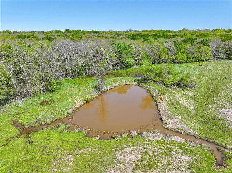 This ±131 acre tract in Edgewood, Texas offers a solid mix of open pasture and river-bottom woods, well suited for running cattle and enjoying quality hunting. The land is fenced and cross-fenced south of the power lines, providing dependable grazing for livestock. The north end of the property borders the Sabine River, where heavy timber and natural cover create excellent wildlife habitat. Because the river bottom can take on the occasional high water, fencing is minimal in that area, making the river bottom more ideal for hunting rather than pasture use.
This property has a proven history of strong whitetail hunting, including a 23-point buck taken on the place. An existing easement provides access to the north pastures and adds flexibility for managing the land.
The custom two-story bardominium offers 3 bedrooms and 2 full baths, with living space both upstairs and down, allowing for multi-family use or guests. The downstairs primary bedroom features hardwood paneling milled from trees harvested right on the property, giving the home an authentic ranch feel.
Located in Edgewood ISD, this is a working piece of land with the right balance of function and recreation. Whether you’re looking to graze cattle, hunt the river bottom, or own a place where you can live and work the land, this property is built for it.