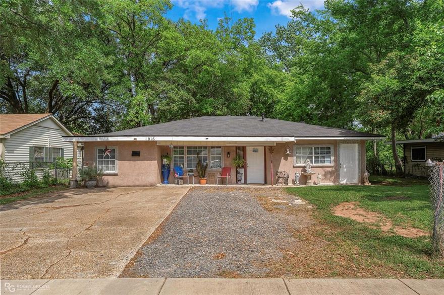 This spacious home with a great backyard is ready to be yours! As you step inside the open-concept living space, you'll immediately notice all the great natural light throughout. The living room leads into the dining area that includes a built-in desk with cabinets, perfect for an office or study nook. From there, the large kitchen flows seamlessly, complete with plenty of cabinets, modern appliances, and room for a breakfast table for less formal meals. The four bedrooms are spacious and share two full baths, ensuring privacy and convenience for guests or family alike. Vinyl plank floors throughout most of the rooms allows for easy maintenance without sacrificing style and the neutral color palette throughout gives you the opportunity to make this home your own. Outside, the backyard features mature trees and plenty of room for outdoor activities like gardening, building a playset, or maybe installing a firepit area. Conveniently located by Benton Rd and Airline Dr as well as local shopping and dining. Don't wait, schedule your tour today!