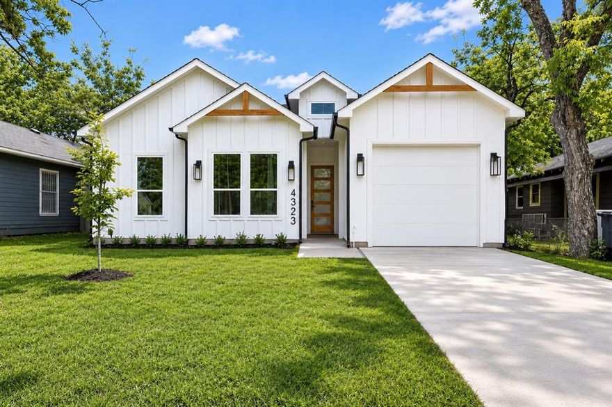 Welcome to this beautifully designed modern transitional home in the heart of one of Dallas' most promising areas— minutes from Fair Park, Downtown Dallas, and all major highways. Thoughtfully crafted with premium finishes rarely found at this price point, this quiet retreat checks every box.

This 3-bed, 2-bath home features an efficient yet spacious floor plan with oversized windows, ambient lighting, and a cozy electric fireplace. The chef-inspired kitchen boasts custom cabinetry and a built-in microwave, while the expansive primary suite impresses with a spa-inspired walk-in shower, freestanding soaking tub, and custom walk-in closet.

Step outside to a huge fenced backyard shaded by mature trees — perfect for relaxing or entertaining. Don't miss your chance to own in one of Dallas's most rapidly evolving areas.