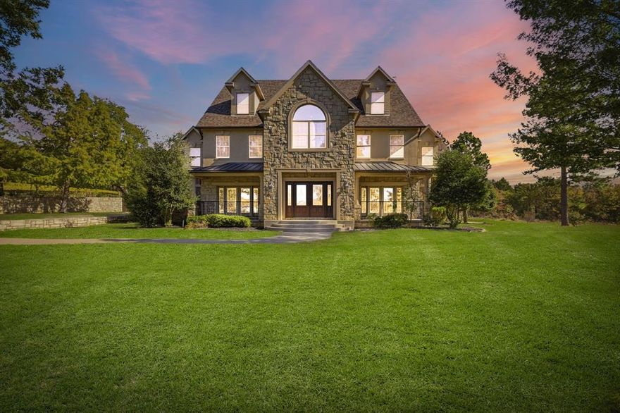 Exceptional 5,216 SQFT CUSTOM ESTATE on 1.5 Acres in Denison, TX

Custom estate crafted by a MASTER BUILDER for his own residence—every inch showcasing unmatched craftsmanship & thoughtful design. Set on 1.519 manicured acres surrounded by mature trees.

Step inside to a dramatic GRAND FOYER with custom elevated spiral staircase & HAND-SCRAPED HARDWOOD floors. Expansive floor plan includes 2 living areas, stone-accented FP, & seamless flow into a chef-inspired gourmet kitchen - granite counters, oversized island, bar seating, extensive cabinetry, all built-in appls, & furnished dining area.

EXECUTIVE-LEVEL OFFICE features solid ash doors & ash-clad ceiling. Additional highlights: plantation shutters, intricate millwork, premium hardware throughout.

The ENTERTAINMENT WING is a showstopper—oversized game rm & lounge w central sound system for entire home, full bar, fridge, pantry, sink, ice maker, beer tap & kegerator, dishwasher, & billiards table. Finished attic offers 850+ SQFT of flexible, AC’d bonus space—ideal for playrm, studio, gym, or media rm.

Upstairs, the lavish primary suite offers vaulted ceilings, adjoining flex rm w screened-in balcony access, & spa-like ensuite w full-size jetted tub. Secondary BDs include walk-in closets & attached BAs.

Outdoor living impresses w multiple covered patios, balcony w mounted TV, double grill setup, & furnished outdoor dining. Beautifully landscaped, cross-fenced backyard completes the setting.

Car lovers will appreciate the 1,333 SQFT 4-car garage featuring its own ½ BA, sink, & 15x37 upstairs storage rm. Home also includes a 3rd-floor climate-controlled storage level.

Located mins from Texoma Medical Center, Lake Texoma, Downtown Denison, Pottsboro schools, & the upcoming Margaritaville Resort, this estate delivers spacious living & refined finishes in one of North TX’s most desirable growth corridors.

A rare opportunity—homes of this caliber & craftsmanship don’t come around often.