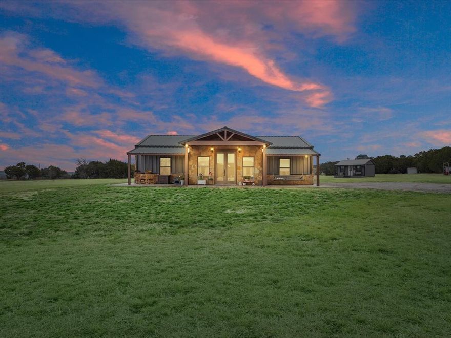 Meridian, Texas, this 6.72 acre property at 121 Private Road 2121 in the Crossbow Ranch & Wildlife Preserve offers a tranquil, modern lifestyle. It is 2 bedrooms & 2 bathrooms; the primary bedroom includes an ensuite with a clawfoot tub and a spacious walk-in closet, while the second bedroom provides privacy & convenience. The heart of the home is the open-plan living area w a well-appointed kitchen, complete w ample storage, stained concrete floors throughout. A large pantry doubles as an office space, & the laundry room features a practical mud area leading to the patio. Outside, a versatile work shed w a covered deck is perfect for various hobbies or storage. Residents enjoy non-hunting access to 600 plus acres of trails, a gun range, clubhouse, & diverse wildlife in the preserve, along w a wildlife tax exemption. This property, nestled in a community known for its natural beauty, is an ideal retreat for those seeking a blend of rural serenity & modern conveniences.
