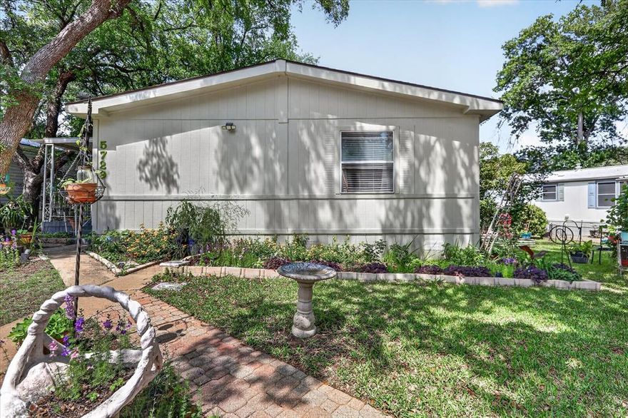 Charming and beautifully updated 3-bedroom, 2-bath home offering 1,456 sqft of comfortable living space in a peaceful, well-maintained community. This home features a brand new roof, new flooring throughout, and tastefully updated kitchen and bathrooms, making it truly move-in ready.

Step inside to an inviting layout filled with natural light, while outside you’ll enjoy mature trees, lush greenery, and a serene setting that provides both privacy and relaxation. The property also includes two nicely sized storage sheds, perfect for tools, hobbies, or extra storage.

Located in a unique owner-occupied-only neighborhood, this community offers pride of ownership and a quiet, welcoming atmosphere. If you’re looking for a well-kept home in a tranquil setting, this one checks all the boxes.

Come experience the charm and comfort for yourself!

This is on a rented lot of $900mo, you will have to get approved through the community before closing on the home. This is owner occupied community only, the home cannot be rented out.