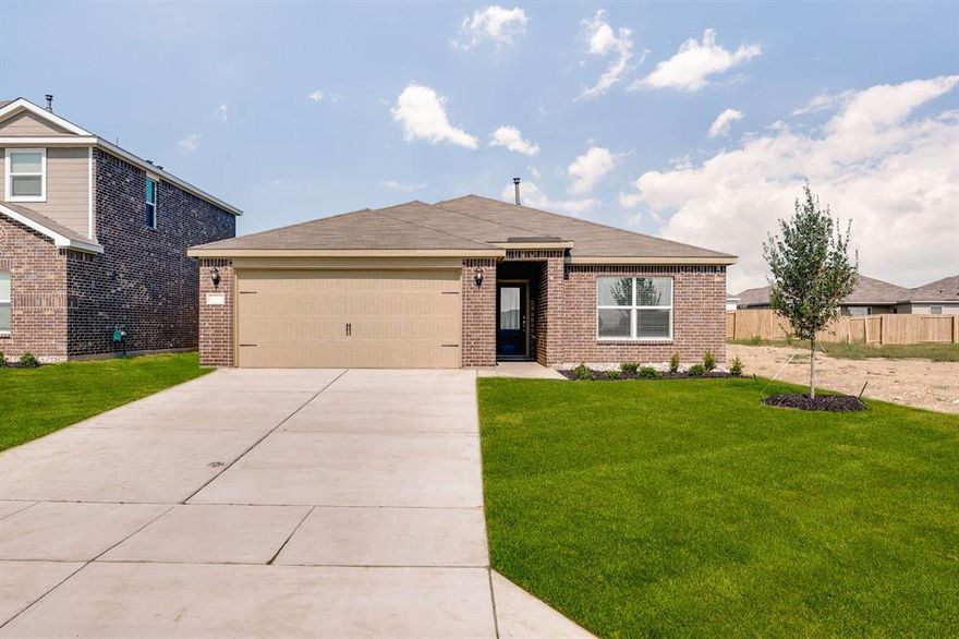 The Ashton is a beautifully designed one-story home featuring three bedrooms, two bathrooms, and a charming brick exterior with a welcoming covered porch. Inside, the open-concept layout seamlessly connects the kitchen, dining, and family rooms, perfect for everyday living and entertaining. The attached two-car garage provides convenience and protection from the elements, while also offering extra storage space. With spacious bedrooms and a thoughtfully designed layout, this home blends elegance, comfort and functionality for the perfect living experience.