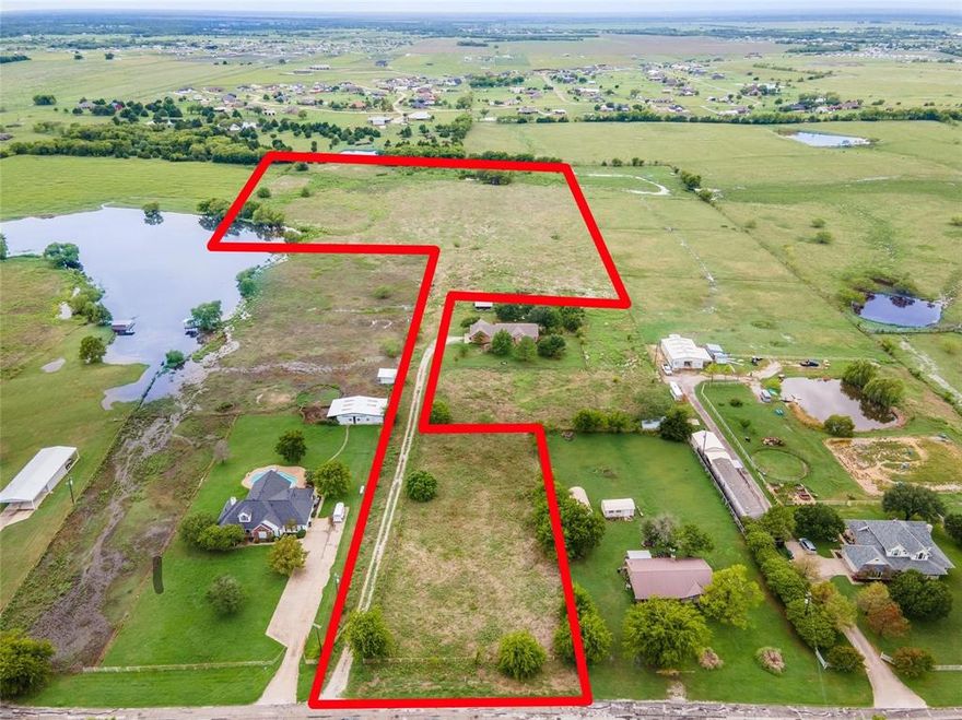 *PRICED TO SELL! GREAT SITE FOR HOMESTEAD* Property boasts of a road-fronting acreage perfect for a home site, and a huge back pasture for farm animals, buildings, or more homesites.  It has a waterfront area to a mini-lake shared with the easterly neighbors, a natural slope to run ATVs in between ponds, a tree-lined border in the south, and a high ground with beautiful views of surrounding areas, perfect site to enjoy sunrise and sunset, and a glimpse of Dallas skyline over treetops when looking westward! Drive down the road and find homes with million-dollar budgets on various stages of construction. This is the least expensive lot-only property among recent sales in the area so come give us an offer we can't refuse!