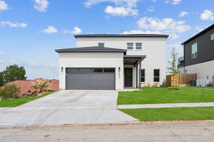 Imagine waking up every morning to the soft glow of sunrise stretching across Eagle Mountain Lake. This brand-new 4 bed, 3.5 bath home sits at the very top of the bluff in Lake Country—high enough to give you sweeping, unobstructed views, yet close enough to feel connected to the water and the lifestyle it brings.

Step inside to light-filled living spaces, clean lines, and modern finishes that frame the view like art. Host friends around the kitchen island while the lake reflects evening colors just beyond the windows. Watch storms roll in from the back patio. Pour a glass of wine and take in the kind of sunset that makes you stop talking mid-sentence.

The layout is designed for both comfort and privacy: a main-level owner’s suite overlooking the lake, generous upstairs bedrooms, a bonus living area, and a guest suite perfect for weekend visitors. Every detail serves the same purpose—to make life feel a little slower, a little brighter, and a lot more beautiful.

This is more than a home.
It’s a view, a feeling, and a life you can’t recreate anywhere else in Fort Worth.