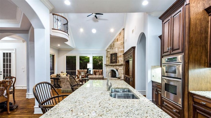 !!!! OVER IMPROVED AND UNDER VALUED !!!!  ENJOY LIVING IN WEST PLANO - CONVENIENT TO EVERYTHING AND TO EVERYWHERE IN MINUTES- - CUSTOM BUILT BY K HOVNANIAN ON A PREMIUM LOT WITH A  PRIME LOCATION. ENJOY THE OPEN SPACES ACROSS THE STREET WITH PARKS - COMMUNITY POOL - PLAYGROUND AND CLUBHOUSE.  INCLUDED IN THE UPGRADES ARE : HARDWOOD FLOORS IN ALL BIG ROOMS - 2 PRIMARY BEDROOMS DOWSTAIRS WITH FULL BATHS AND CUSTOM CLOSETS - WALLS OF WINDOWS WITH PLANTATION SHUTTERS AND WINDOW COVERINGS - STAINLESS APPLIANCES - COMMERCIAL GRADE GAS COOKTOP - BUILT IN REFRIGERATOR- DOUBLE OVENS - MULTIPLE OVERSIZED CABINETS FOR STORAGE - LARGE GRANITE ISLAND WITH SEATING- VAULTED CEILINGS - BEAUTIFUL STONE FIREPLACE- BUILT IN WALL SYSTEM FOR LARGE TV AND SOUND SYSTEMS - UTILITY ROOM WITH ADDITIONAL STORAGE OR COULD BE A WINE ROOM !!!! UPSTAIRS - LARGE GAMEROOM WITH FRENCH DOORS VIEWING THE DOWNSTAIRS GREAT ROOM  -  HOME OFFICE WITH BUILT-IN DESK & CABINETS   PLUS  THE LARGE  3RD BEDROOM AND BATH. THE COVERED ENCLOSED SUNROOM PATIO  OPENS TO THE OUTSIDE GARDEN -BARBEQUE GRILL AND LANDSCAPED SIDE YARD. THIS IS  A VERY PRETTY HOME WITH HANDSOME CURB APPEAL AND THE  OPPORTUNITY TO LIVE IN WEST PLANO AT A $$$$ VALUE PRICED HOME $$$$  DONT MISS THIS WONDERFUL QUALITY HOME IN A PRIVATE NEIGHBORHOOD. LENDER LOAN AVAILABLE $$$ 6.1% FIXED RATE -20% DOWN-30 YR - SUBJECT TO CHANGE- CALL LISTING AGENT FOR INFORMATION $$$