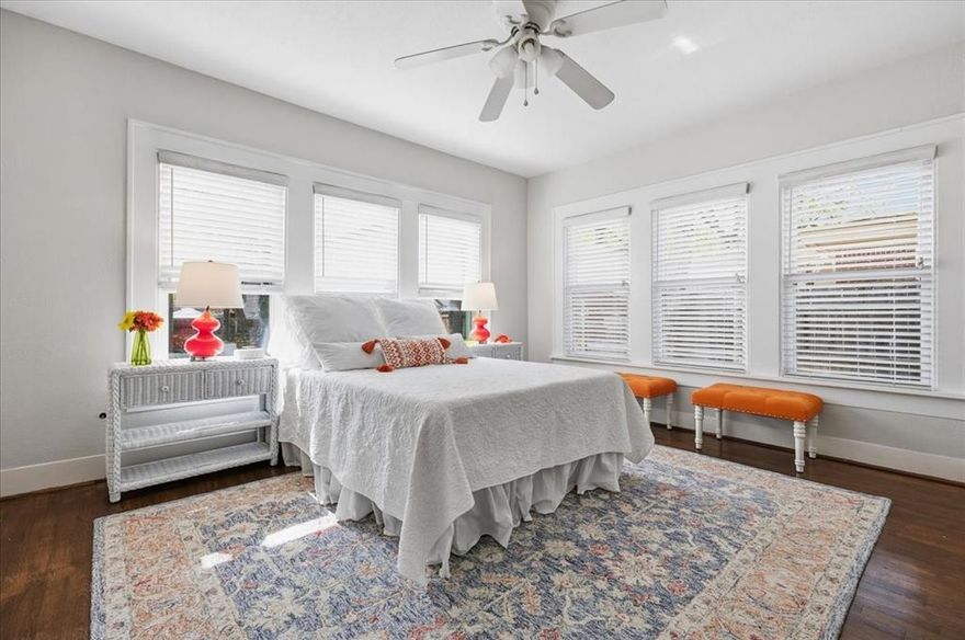 The epitome of historic  Arlington Heights architecure and charm!  Professionally remodeled with care into a true 2 bedroom, 2 bath layout, this home offers an open floor plan with generous room sizes, great natural light and attention to detail. The owner has spent almost $150,000 in remodeling and updates, which include: All windows replaced, New Primary bath and walk-in closet, remodeled second bath, total kitchen remodel, New oversized 2-car garage, new front porch, walkway and flower beds, backyard decking, and all attic insulation replaced. You will love the large island kitchen, featuring beautiful granite countertops, stainless appliances, farm sink, abundent storage, breakfast bar, and plenty of room to cook, gather, and create memories. A handsome  deck was built off the kitchen with space for outdoor dining and entertaining. The primary suite is both a treat and retreat of its own, complete with a  a full bath with two sinks, a custom shower with multiple shower heads, and  walk-in closet.   A second full bath is in the hallway, adjacent to the second bedroom and serves as powder room for guests, and a lovely complement to the secondary  bedroom.  Beautifully refinished hardwood floors are throughout the house, (no carpet!),with tile flooring in the bathrooms. Roof is 8 years old.