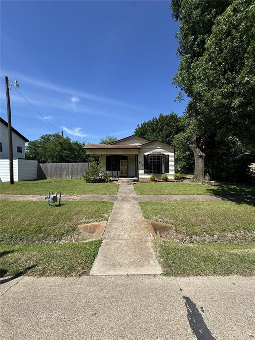 Charming fixer-upper located on a quiet street in the small town of Ennis, Texas—home of the famous Ennis Bluebonnet Trails Festival, local shops, dining, and small-town charm. This 3-bedroom, 2 full bath home offers great potential for an investor or first-time homebuyer not afraid of a little work and ready to make it their own. Conveniently located close to schools, shopping, and everyday amenities while still enjoying a peaceful neighborhood setting. Less than an hour from Dallas and Fort Worth, making for an easy commute or weekend getaway from the city. With a little vision and TLC, this property could truly shine. Buyer and buyer’s agent to verify all information.
