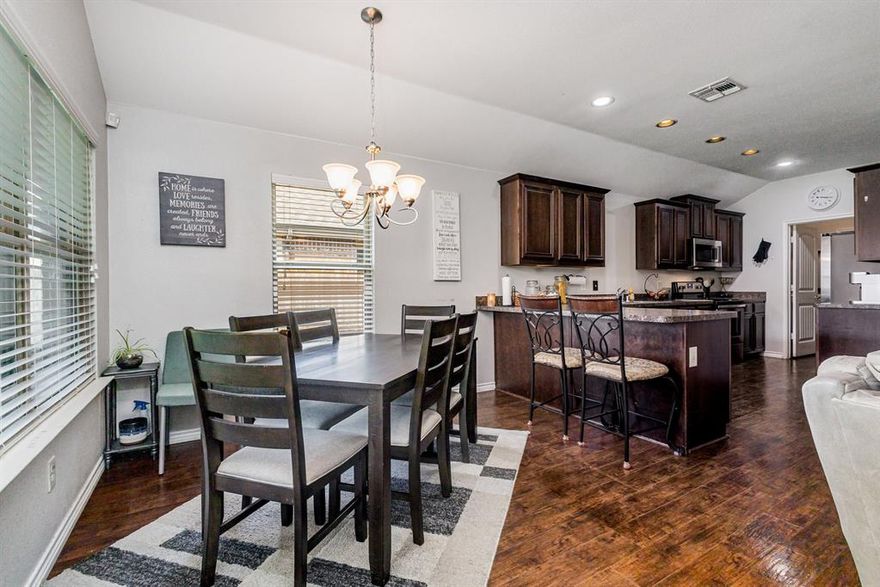 Charming beautiful home with four bedrooms and two baths centered around a generous communal space that includes a kitchen, dining area, and living room that overlooks the backyard. The home also includes solar panels. It offers a solid foundation, good build quality, and is situated in a vibrant section of the neighborhood that’s walkable to schools and amenities. The community also offers access to Heartland Parks, pool with waterslide, gym, and sports fields, as well as community events and gatherings!