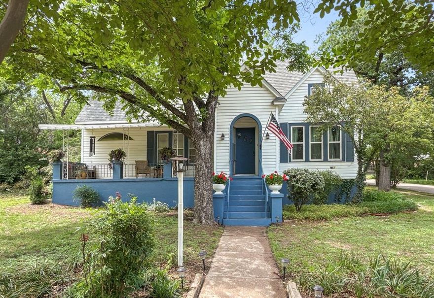 Step into Hamilton’s history with this charming early-1900s home, now on the market for only the second time in its history. Offering 3 bedrooms, 2 baths, and just over 2,000 sq. ft., it blends vintage character with thoughtful updates.

You’ll find original hardwood floors, a sunroom filled with natural light, and a casual dining room with a built-in china cabinet. The corner lot features a unique three-tier fenced yard, mature trees, and a detached two-car garage connected by a covered walkway. The unfinished attic provides room to expand if desired.

Modern upgrades include central heat and air, PEX plumbing, a water filtration system, and updated windows. The interior does need a fresh coat of paint, and the original hardwoods are ready for refinishing - perfect for buyers who want to add their own finishing touch.

Located near schools, churches, dining, and shopping, this property offers a rare chance to own a piece of Hamilton’s heritage while making it truly your own.