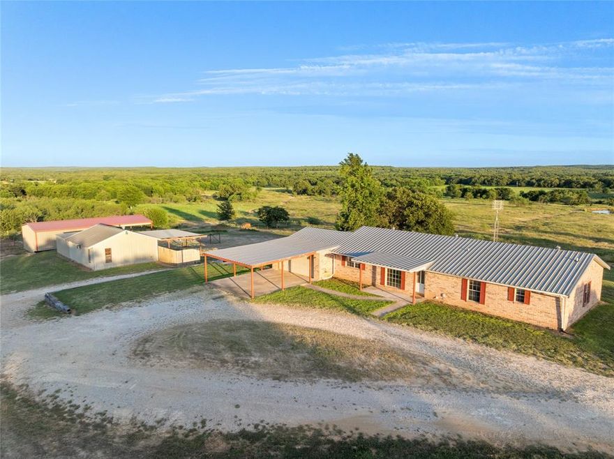 What a beautiful view upon entering this country home. Set high on the hill overlooking your pasture and pond, just the perfect place to call home with  new metal building to hold all the toys and an  extra garage, storage building with plenty of outside covered areas. The home is very light and bright with spacious rooms thru out. Nice, big roomy kitchen, entrance off kitchen to a storm cellar for stormy weather. Home is move in ready so come out and take a tour of this one of a kind property. In an area of larger tracts of land so a lot of peace and quiet out here to see the stars at night.