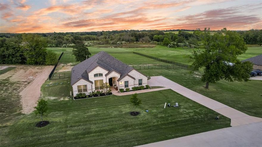 Welcome to the coveted cul-de-sac community of Hunter Estates—where luxury living meets the charm of wide-open space. Built in 2023, this beautifully designed single-story home sits on a premium 1.4-acre fenced lot, offering endless possibilities for outdoor living, entertaining, or simply enjoying the peace and privacy. Inside, the thoughtfully designed floor plan features 4 bedrooms, a dedicated private study, and two spacious living areas. The split-bedroom layout provides a serene primary retreat set apart from the secondary bedrooms, while the additional bedrooms and second living space are tucked away on the opposite side—perfect for guests or family flexibility. The open-concept design seamlessly connects the main living areas, highlighted by a cozy fireplace, modern finishes, and a well-appointed kitchen with a gas cooktop. A sprinkler system adds convenience, while the overall layout offers both functionality and style. With its blend of space, comfort, and contemporary design, this home delivers an exceptional lifestyle in one of the area’s most desirable neighborhoods.
